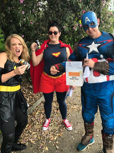 Superheroes protecting the environment: a team of volunteers in Australia completing one of the tasks in the “amazing race"
