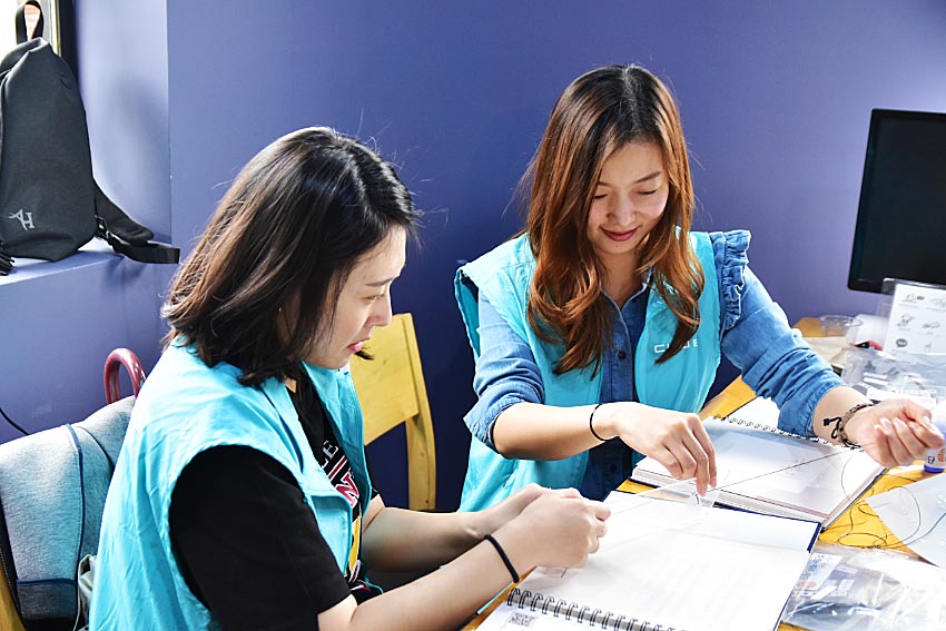Volunteers making special tactile books in Korea